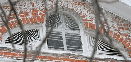 Daytime view of an attic window at MSK Attorneys office in Burlington, Vermont