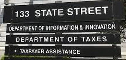 Close up view of a sign outside the Vermont Department of Taxes